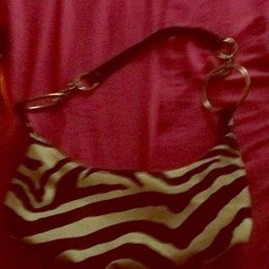 A black and white shoulder hand bag